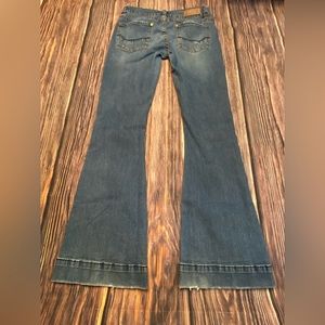 Rock & Roll Trouser Jeans Size 29x34. Belt loop patch. frayed pockets and hems.